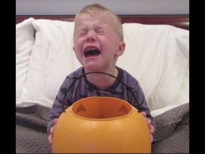 Kid crying because some moron doesn't know that you give out candy on Halloween